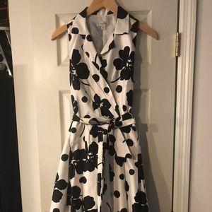 Women’s sleeveless black/white bow tie dress.